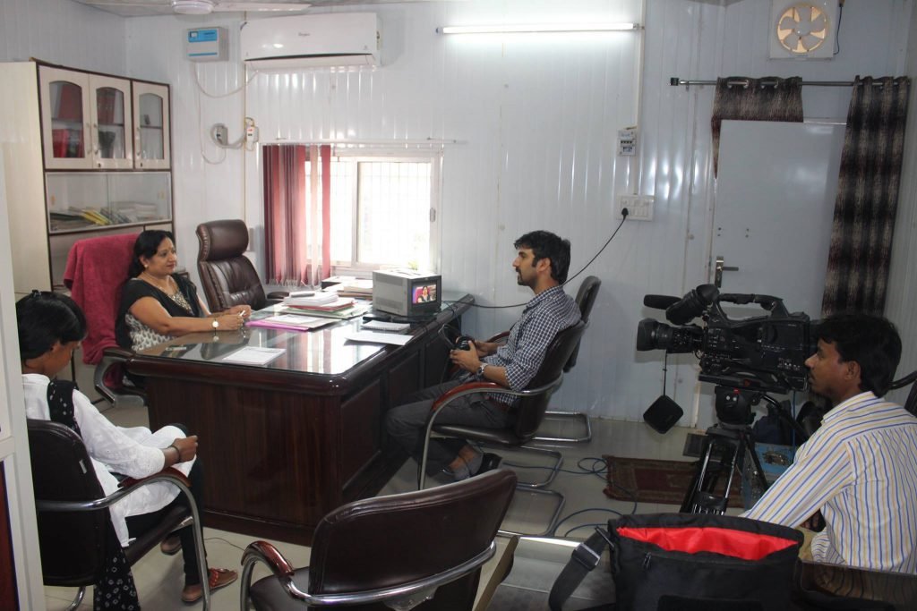 Office production with camera and monitor